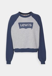 Sudadera gris con mangas raglán en azul marino. Presenta un destacado logo azul de Levi's en la parte frontal. Fabricada con un tejido suave y texturizado.