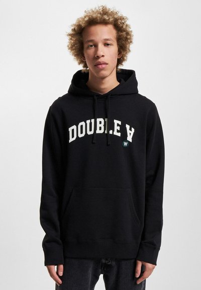 Black hoodie with front pocket and drawstring hood. Features white "DOUBLE V" text on chest. Made of soft material with a relaxed fit.