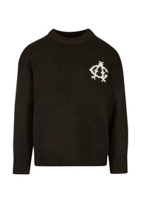 Brązowy sweter z dzianiny o okrągłym dekolcie, z prążkowanymi mankietami i dołem. Posiada biały logo po lewej stronie. Miękka tekstura, luźny krój.
