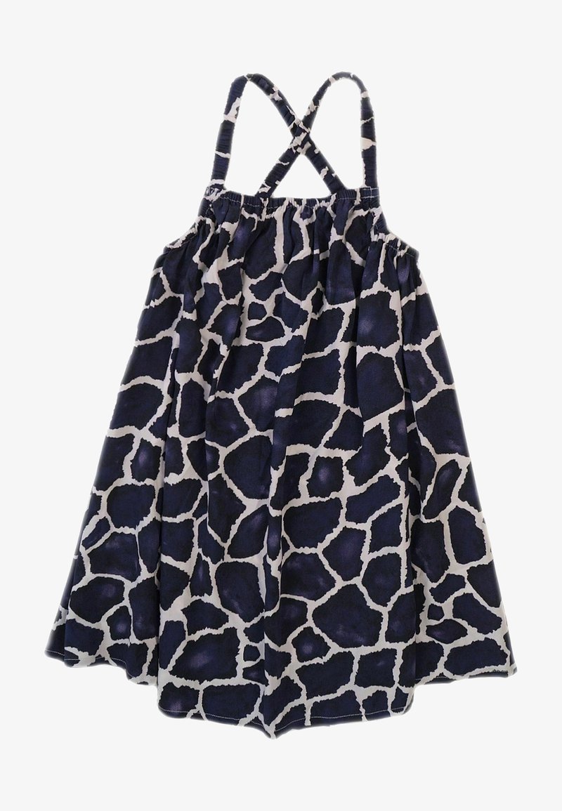 Robe à motif girafe aux couleurs bleu marine et blanc. Présente des bretelles croisées ajustables et une taille froncée pour une silhouette en A.
