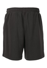 Svarta bomullsshorts med elastisk midja, med en avslappnad passform, slät textur och utan synliga fickor eller dekorationer.