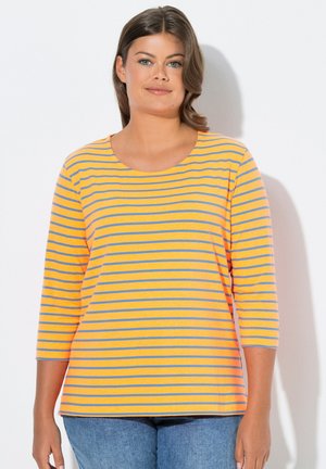 - Bluzka z długim rękawem