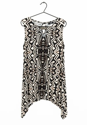 Czarny i biały bezrękawnik z geometrycznymi wzorami, posiadający dekolt w kształcie łezki oraz ozdoby z koralików przy szyi. Miękka tekstura.