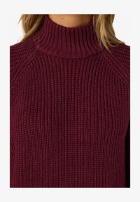 Maglia collo alto Maria Bellentani donna bicolore beige e nera Maglia collo alto Maria Bellentani donna bicolore beige e nera