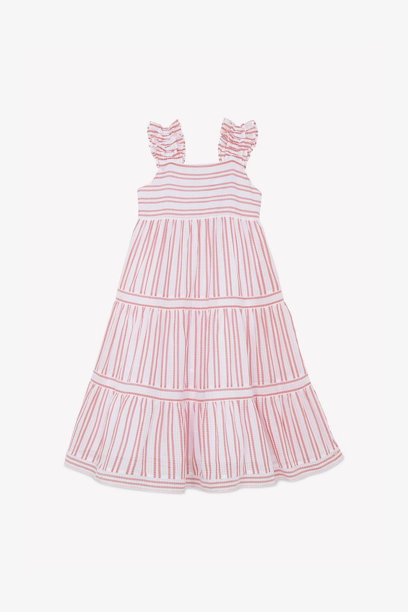Λευκό φόρεμα με κόκκινες κάθετες ρίγες, βολάν στους ιμάντες των ώμων, σχεδιασμός σε στρώσεις και ρέον τελείωμα. Κατασκευασμένο από ελαφρύ ύφασμα.