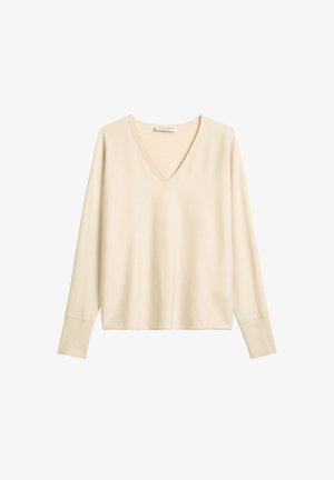 Beige lange mouw V-hals trui, zachte textuur, relaxte pasvorm, geribde manchetten en zoomdetails. Eenvoudig en veelzijdig ontwerp geschikt voor layering.
