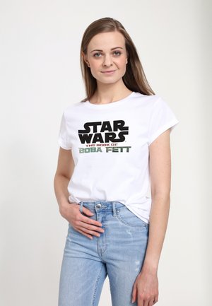 T-shirt en coton blanc avec un imprimé graphique audacieux portant "STAR WARS THE BOOK OF BOBA FETT" en texte noir et vert. Coupe décontractée.