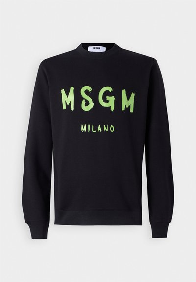 Zwarte sweatshirt van katoen met grote groene tekst "MSGM" en "MILANO." Lange mouwen met geribde boorden en een ronde halsontwerp.