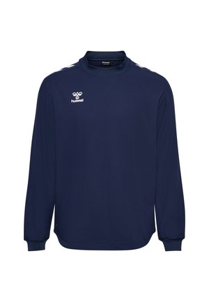 Granatowa sportowa koszulka z długim rękawem, wysokim kołnierzem, białym logo pszczółki Hummel na piersi oraz białymi paskami w kształcie litery V na ramionach.