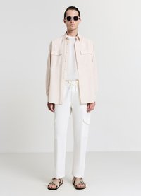 Calliope UNITA - Cargohose - bianco lana