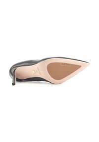 Black leather high-heeled shoe with a pointed toe, featuring a smooth upper and a tan rubber sole with a textured grip pattern.