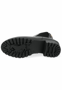 Semelle de botte en caoutchouc noir avec un motif de semelle profond. Logo légèrement en relief et graphique d'animal visibles. Matériau durable avec une surface texturée.