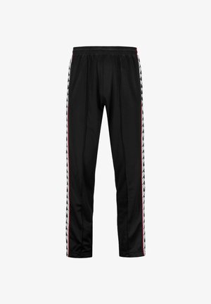 Pantaloni sportivi neri con cintura elastica, caratterizzati da strisce laterali bianche e rosse con motivi grafici ripetuti. Tessuto dalla texture liscia.
