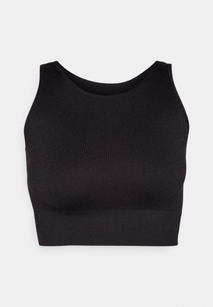 Black ribbed crop top with a high neckline and wide armholes, featuring a soft, stretchy fabric for comfort and a seamless design.