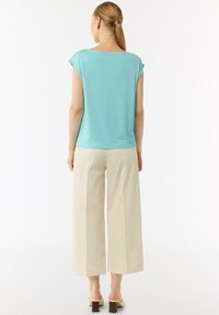 comma MIT ÜBERSCHNITTENEN SCHULTERN UND RAFFUNG - T-Shirt basic - helles türkis