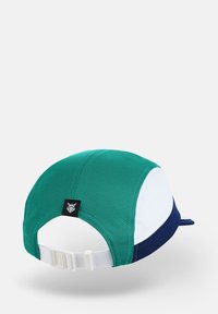Five-panel cap with green mesh fabric, white and navy panels, adjustable white strap, and a black logo patch on the back.