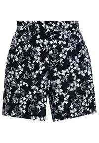 Shorts noirs avec un motif floral blanc, présentant une texture lisse et une coupe ajustée, conçus avec des poches latérales et une ceinture plate.