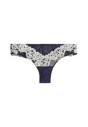 Tanga azul marino con una cinturilla de encaje floral. Tejido suave con contraste de texturas, que presenta detalles de encaje intrincados y un borde en forma de onda.