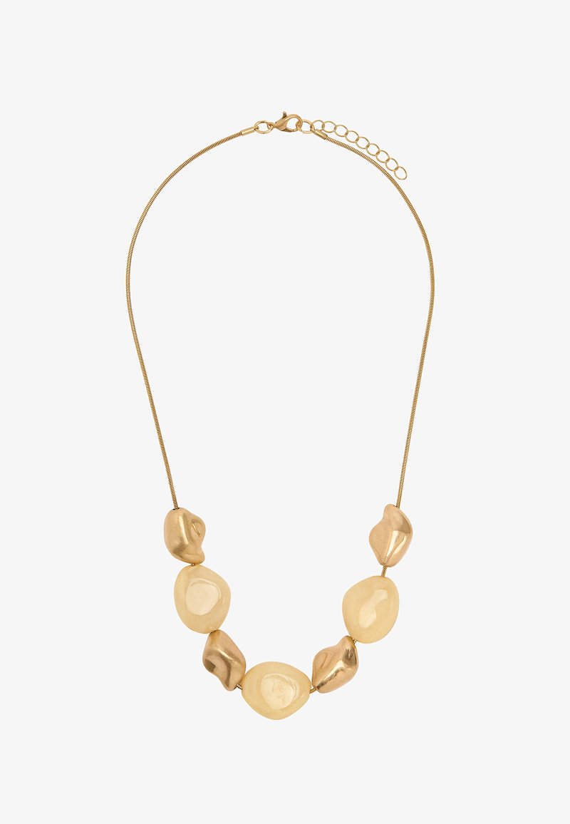 Naszyjnik w kolorze złotym z siedmioma gładkimi, nieregularnymi owalnymi i kamyczkowatymi koralikami na cienkim łańcuszku typu snake z zapięciem karabińczyk i przedłużką.