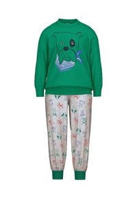 Groene sweatshirt met een hondenafbeelding en bandana-print, gecombineerd met grijze joggingsbroek met meerkleurige hondenillustraties.