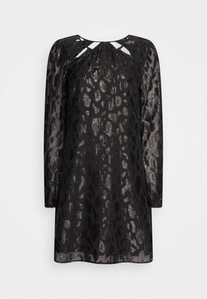 Robe noire transparente à manches longues avec imprimé léopard métallique, détails de décolleté découpé et poignets élastiques, présentée sur un fond uni.