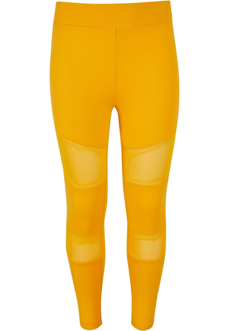 Gule leggings laget av elastisk materiale, med gjennomsiktige mesh-paneler på lårene, og en glatt, tettsittende design.