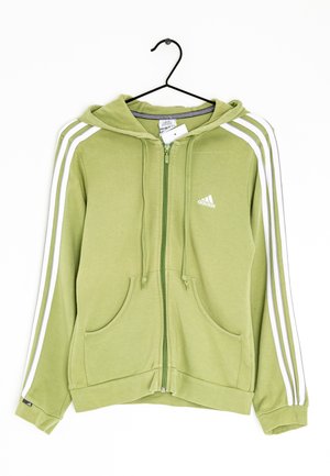 Jasnozielona bluza z kapturem na zamek Adidas z białymi paskami na rękawach, przednimi kieszeniami, kapturem ze ściągaczem i logo Adidas na piersi.