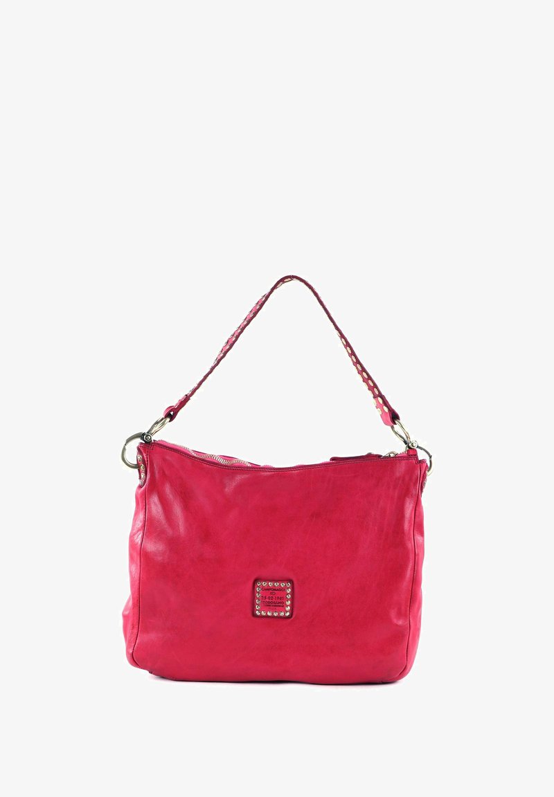 Pink leather shoulder bag with a textured surface, a top zipper, and a decorative square patch featuring metallic studs on the front.
