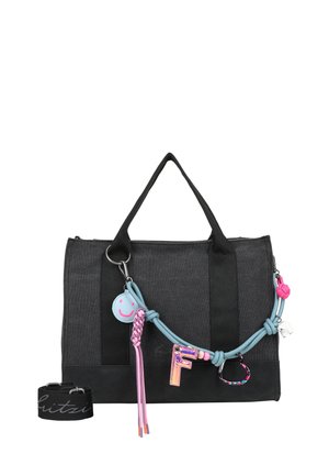 Black fabric bag with dual handles, featuring colorful charms and decorative rope accents. Includes a matching black wristband.