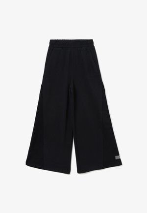 Black wide-leg pants made of soft fabric, featuring an elastic waistband and side pockets, with a small logo tag on the lower leg.