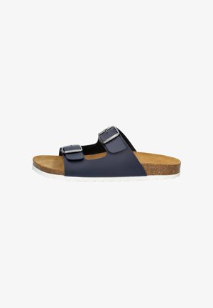 Navy blue slide sandal with two adjustable straps, silver buckles, a cork footbed, and a white rubber sole showcasing a textured finish.