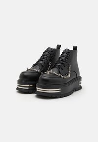 Koi Footwear THE SILENCE PLATFORM GRUNGE BOOTS UNISEX - Šněrovací kotníkové boty - black