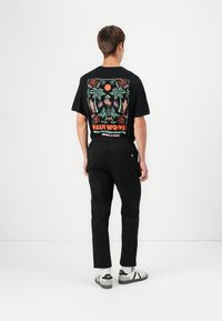 Jack & Jones JPSTACE NEO PANTS - Trousers - black