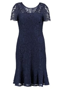 Abito in pizzo blu navy con maniche corte, scollatura a giro, vita aderente e orlo svasato. Motivo floreale in pizzo su tutta la superficie.