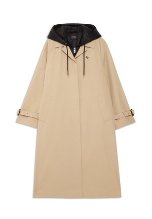 Beige raincoat with a black hood, featuring a relaxed fit, large front pockets, and adjustable wrist straps. Includes a detachable hood.
