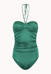 Maillot de bain une pièce vert avec des détails froncés, des liens réglables autour du cou et de petites perles décoratives au niveau de l'encolure. Texture lisse.