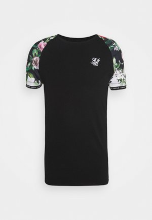Sort kortærmet skjorte med blomsterprint på skuldre og ærmer, hvidt logo på venstre bryst og SikSilk tekst på ærmekanter.