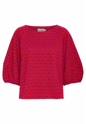 Rode en paarse blouse met een patroon van diamantvormen, brede mouwen en een rechte zoom. Gemaakt van een textuurstof met een losse pasvorm.