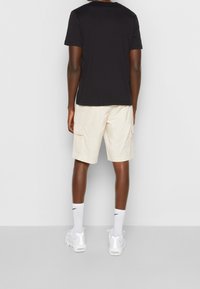 Champion Rochester Triko s potiskem - black