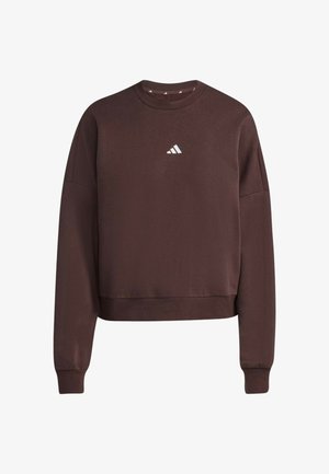 Felpa marrone a maniche lunghe con scollo rotondo, piccolo logo Adidas bianco al centro del petto, polsini e orlo a coste.