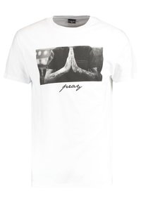 Witte katoenen t-shirt met een zwart-wit grafiek van handen in een bidpositie met het woord "bid" in een cursieve lettertype eronder.