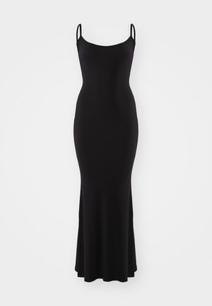 Black ribbed maxi dress with thin shoulder straps, fitted bodice, and flared hem, showcasing smooth texture and a sleek silhouette.