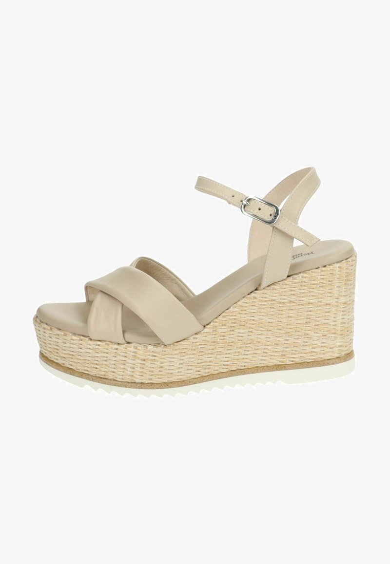 Beige Wedge-Sandalen mit überkreuzten Lederriemen, strukturiertem, geflochtenem Plateau und Gummisohle für einen guten Halt. Silberne Schnalle am Knöchelriemen.