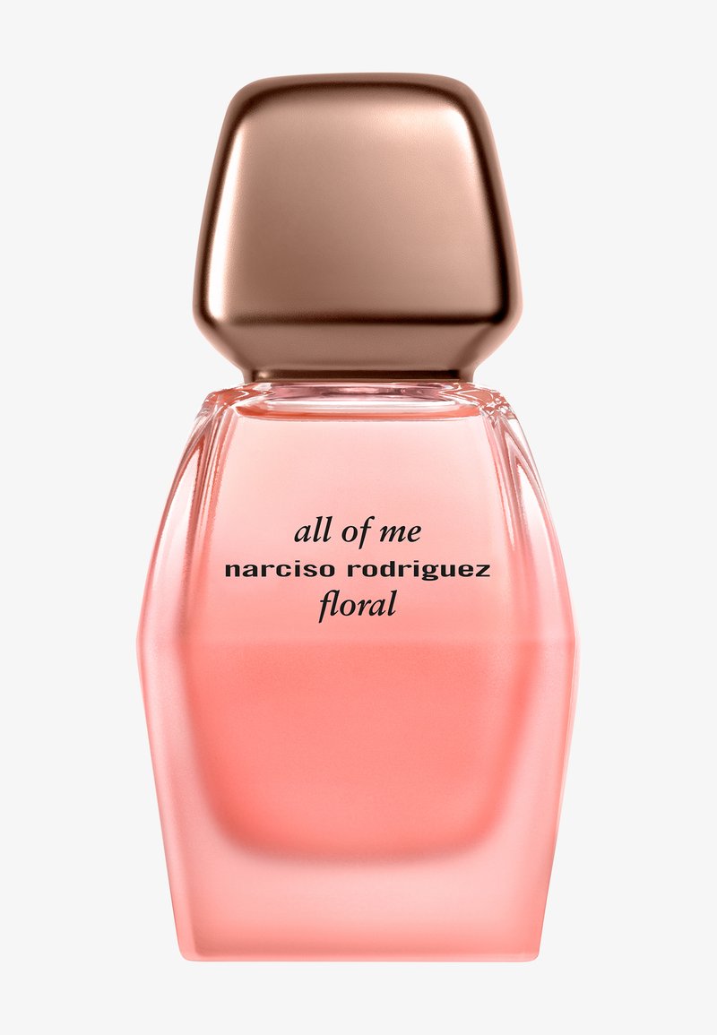 Pinkes Glasparfümfläschchen mit bronzenem Verschluss, beschriftet mit "all of me narciso rodriguez floral", auf weißem Hintergrund.
