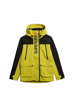 Bright yellow waterproof jacket with black accents, features a hood, two front zip pockets, and large brand logo along the zipper area.