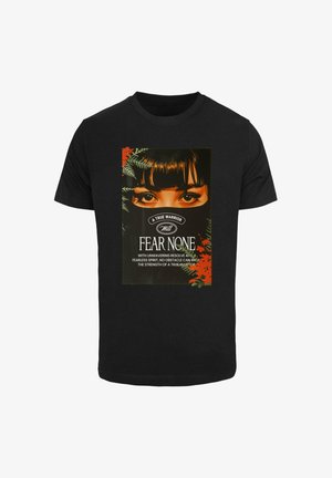 Must vasakist puuvillane T-särk, millel on suurte silmade graafiline print musta maskiga, ümbritsetud rohelise lehestiku ja punaste aktsentidega, ning all tekst.