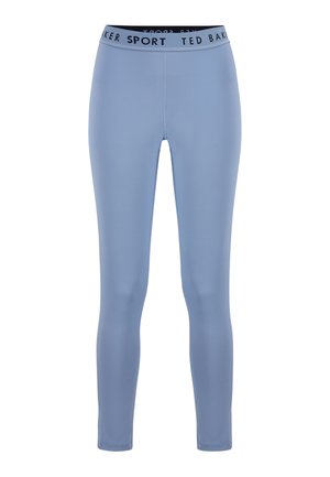 Lichtblauwe, nauwsluitende sportlegging met zwarte elastische tailleband, voorzien van de tekst "TED BAKER SPORT" in wit en zwart.
