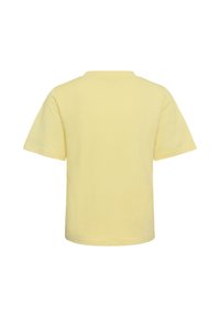 T-shirt jaune clair uni à manches courtes, vu de dos sur fond blanc.