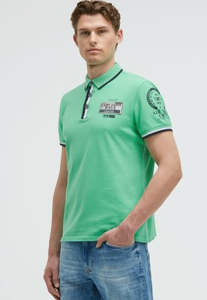 MIT PRINTS UND PATCHES - Polo shirt - flight green