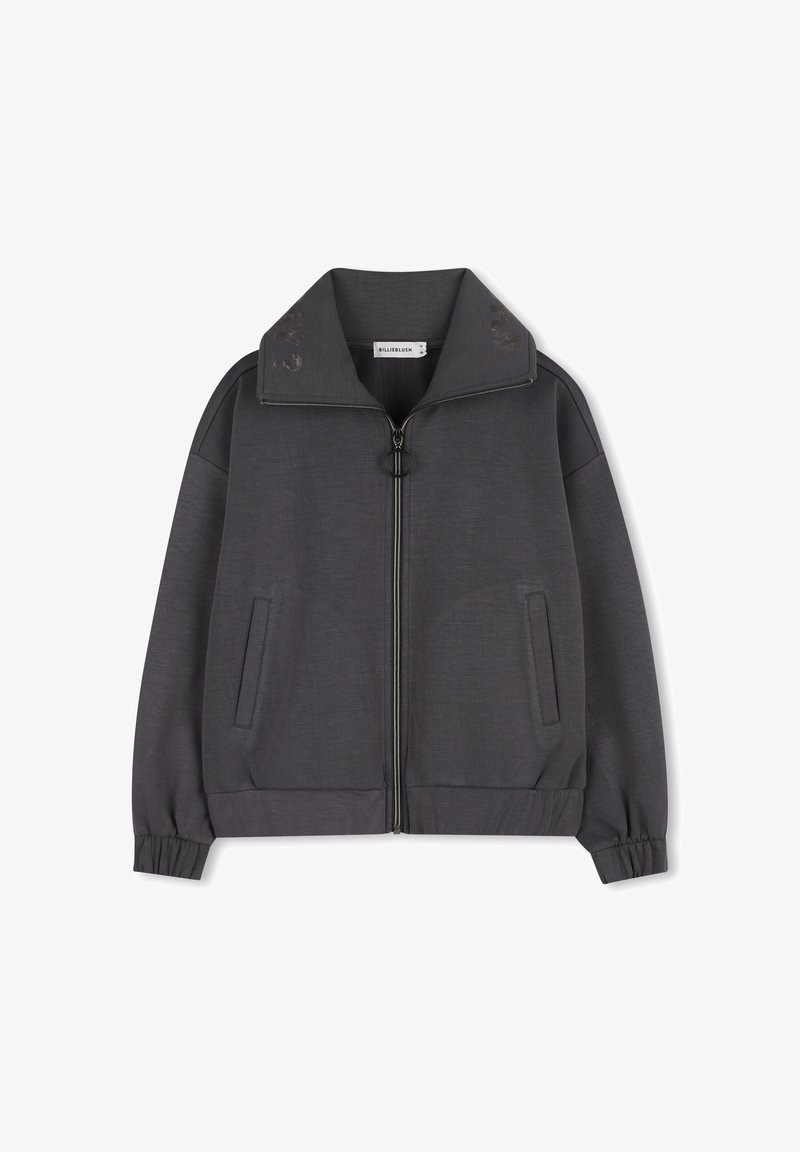 Veste zippée grise avec un col montant, des poches latérales et des poignets côtelés. Tissu lisse avec une texture subtile et des accents brodés sur le col.